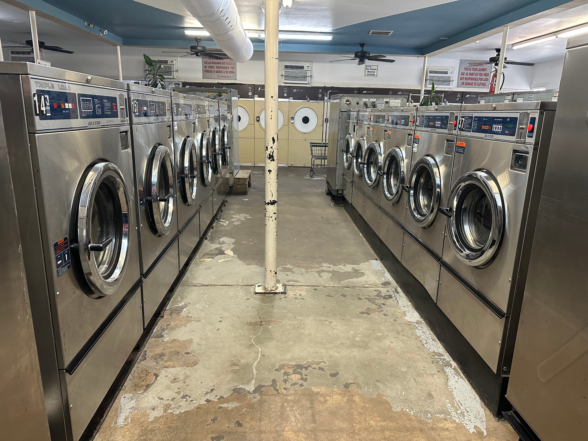 Triple load washers inside the washateria